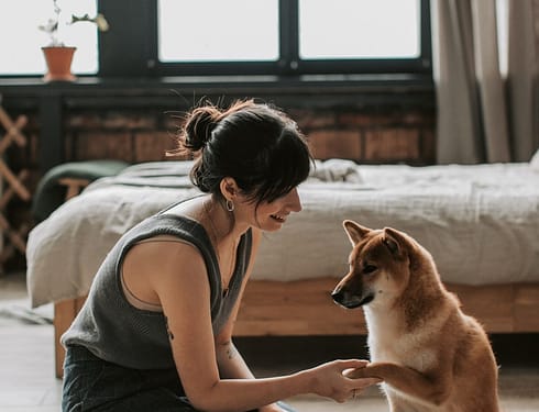 woman training her dog